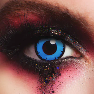 Angelic Blue Halloween Contact Lenses worn for a dramatic eye makeup look with sparkles and vibrant colors.
