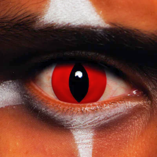 Close-up of an eye wearing Devil Red Halloween Contact Lenses for a striking Halloween look.