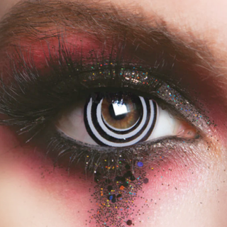 Close-up of an eye wearing Psycho Vein Halloween Contact Lenses with bold red makeup and glitter, perfect for Halloween.