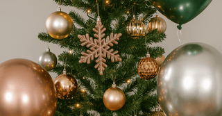 Luxe Metallic Christmas tree with gold, silver, and rose gold ornaments
