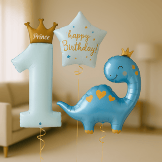 Prince 1st Birthday Helium Balloon Bundle with crown-topped '1', star, and dinosaur balloons in baby blue and gold.