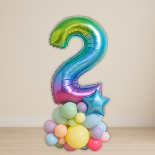 Rainbow number balloon stack with a large colorful number 2, perfect for birthdays and celebrations. Ideal for unicorn and Pride themes.