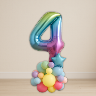 Rainbow number balloon stack featuring large foil number 4 in vibrant colors, perfect for birthdays, unicorn or Pride celebrations.