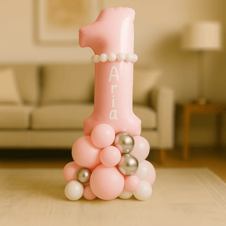 Personalised 1st Birthday Balloon Stack with pink number 1 balloon and custom name for a child’s first birthday celebration.