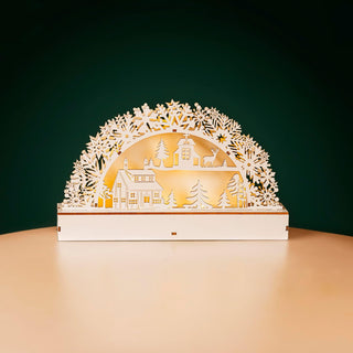 Light Up Wooden Village Christmas Candle Bridge Scene on display with intricate wooden design and festive glow.