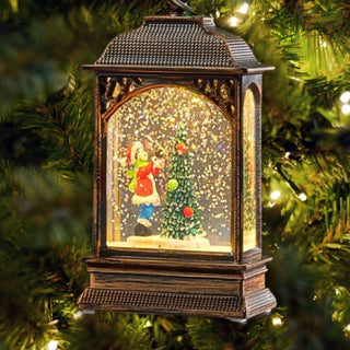Christmas snow globe tree ornament with LED lantern scene featuring a festive Christmas tree and snow.