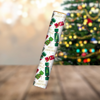 Christmas Cracker Gift Wrap Roll with festive crackers and 'Merry Christmas' script on a white background, 4 metres long.