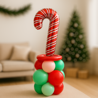 candy cane balloon stack Christmas display with red, green, and pastel balloons in a festive living room setting