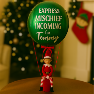 Emerald Green Elf Arrival Balloon with seated elf on red base, "Express Mischief Incoming" message for holiday decoration.