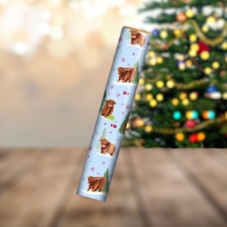 Highland Cow Christmas Gift Wrap Roll with festive scenery, perfect for holiday gift wrapping.