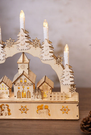 Christmas Village Candle Bridge with LED lights and snow-topped houses